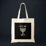 Happy Hanukkah Tis The Season Get Tote Bag<br><div class="desc">Happy Hanukkah Tis The Season Get: A joyful Hanukkah design celebrating the festival of lights. Perfect for sharing warmth and laughter. Bright,  festive,  and inclusive.</div>