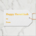 Happy Hanukkah white blue minimalist gold Gift Tags<br><div class="desc">Happy Hanukkah foil typography simple minimalist modern to from blank Hanukkah Foil Gift Tags.
Fully customisable gold foil text,  available in kraft or white paper,  blue back.</div>