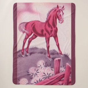 happy horse in pink sherpa blanket
