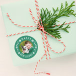 Happy Howlidays Green Pet Dog Photo Classic Round Sticker<br><div class="desc">Holiday stickers feature a round photo of your favourite puppy dog with festive emerald green "Happy Howlidays" frame that includes white modern text,  paw prints,  stars,  snowflakes,  and dog bone accents. The green background colour can be customised. These stickers work well as Christmas card envelope seals!</div>