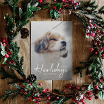 Happy Howlidays | Modern Dog Photo Red Christmas  Holiday Card<br><div class="desc">Simple, stylish custom photo Happiest Howlidays flat holiday greeting card with modern minimalist handwritten script typography in white and a simple gradient over a full photo with a red colour on the reverse. The photo of your beloved pet and text can easily be personalised for a design as unique as...</div>