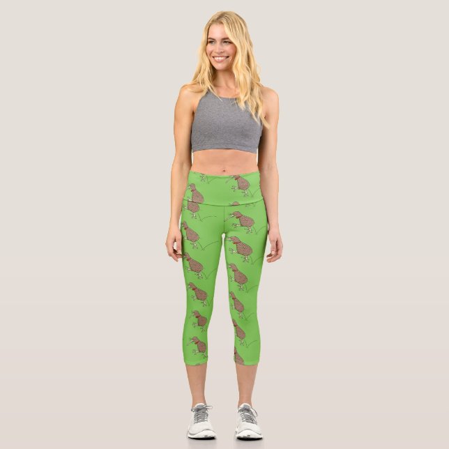 Happy jumping kiwi with bow tie cartoon design capri leggings (Front)