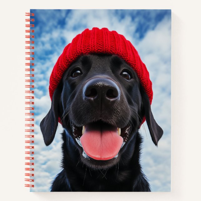 Happy Labrador in a Red Beanie Under a Blue Sky Notebook (Front)