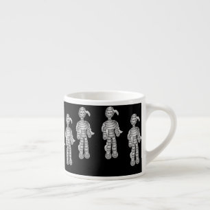 Happy mummies on black espresso cup