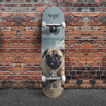 Happy Pug  at the Beach customisable Skateboard<br><div class="desc">Cruise in style with this vibrant skateboard showcasing a joyful pug dashing through ocean waves! The eye-catching beach design brings energy and fun to every ride, while the customisable text allows you to personalise your board with a name, message, or cool phrase. Whether you're skating the streets or displaying it...</div>