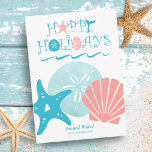 Happy Seashore | Tropical Beach Seashell Christmas Holiday Card<br><div class="desc">Beach theme flat Christmas card features a tropical "Happy Holidays" seashell,  whale tail and ocean waves typography design with big,  bold seashell accents (sand dollar,  starfish and fan seashells). Reverse side is a nautical shell & swirls pattern on a turquoise background. Original artwork KL Stock.</div>