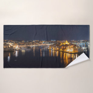 Harbor in Malta illuminated at night Bath Towel