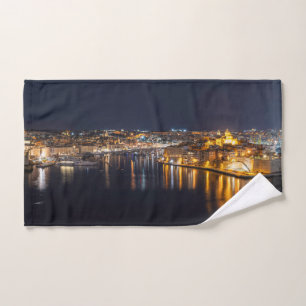 Harbor in Malta illuminated at night Hand Towel