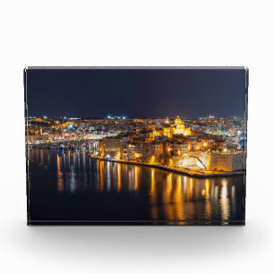 Harbor in Malta illuminated at night Photo Block