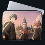 HARRY POTTER™ Hermione & Ron HOGWARTS™ Anime Scene Laptop Sleeve<br><div class="desc">Step into the wizarding world with this stunning illustration featuring Harry Potter™, Hermione Granger, and Ron Weasley standing before the majestic towers of Hogwarts™ at sunset. Bathed in warm golden light and soft twilight hues, the trio stands ready for whatever magical adventure awaits. With wands in hand and Hogwarts rising...</div>