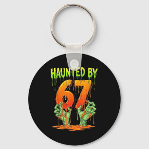 Haunted by 67 funny halloween spooky season key ring