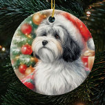 Havanese Dog in a Santa Hat Christmas Ceramic Ornament<br><div class="desc">Elevate your holiday festivities with our charming Havanese Dog in a Santa Hat Christmas Ceramic Ornament. This delightful ornament features an adorable Havanese adorned in a festive Santa hat, adding a touch of whimsy to your Christmas tree. A perfect gift for Havanese dog lovers and pet owners, this handcrafted ceramic...</div>