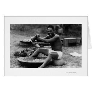 Hawaii - Man Pounding Taro to Make Poi
