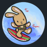 Hawaiian Surfing Bunny Holiday Cartoon Classic Round Sticker<br><div class="desc">There is nothing better than a tropical vacation during the winter holidays! And even better, our adorable surfing bunny, Coco takes on the big waves on the North Shore of Oahu, Hawaii. He brings with him the Aloha sprit for the holidays and wishes you a "Mele Kalikimaka" (Merry Christmas). This...</div>