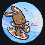 Hawaiian Surfing Bunny Holiday Cartoon Classic Round Sticker<br><div class="desc">There is nothing better than a tropical vacation during the winter holidays! And even better, our adorable surfing bunny, Coco takes on the big waves on the North Shore of Oahu, Hawaii. He brings with him the Aloha sprit for the holidays and wishes you a "Mele Kalikimaka" (Merry Christmas). This...</div>