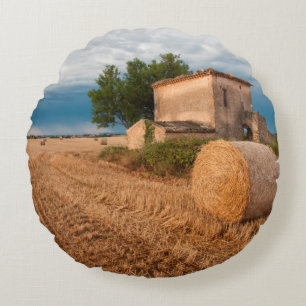 Hay bale in Provence field Round Cushion