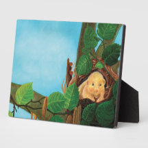 Hazel dormouse eating hazelnut  