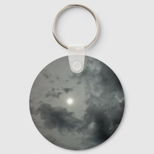 Hazy sun through two layers of cloud key ring