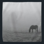 Hazzy Grazing Grayscale Bandana<br><div class="desc">A horse eats some grass in the middle of a field of rolling hills during a foggy morning in Ozark Missouri in late winter. Looking for more prints or products? Feel free to visit my store: http://www.zazzle.com/timelessmomentsphtgy This photo was taken by Jennifer White with Timeless Moments Photography. All images are...</div>