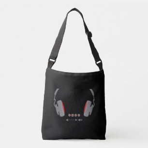 Headphones with media volume control buttons crossbody bag