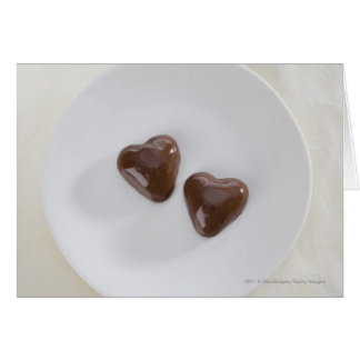 Heart shaped chocolate candies on a plate