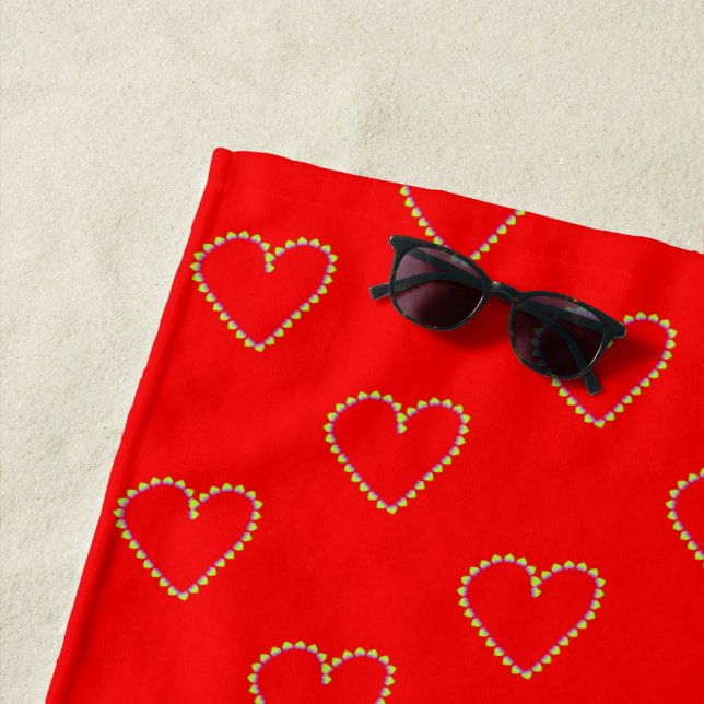Heart shaped hearts on red beach towel (In Situ)
