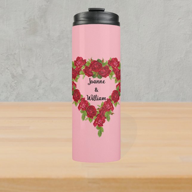 Heart shaped wreath of red roses on light Pink Thermal Tumbler (Romantic heart shaped wreath of red roses and leaves on light pink thermal drink bottle.)