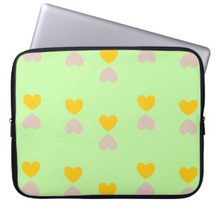 Hearts shapes on light green laptop sleeve