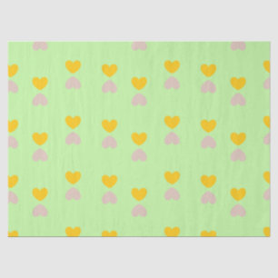 Hearts shapes on light green tissue paper
