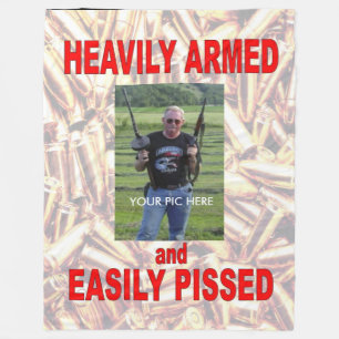 HEAVILY ARMED and EASILY PISSEDFleece Blanket