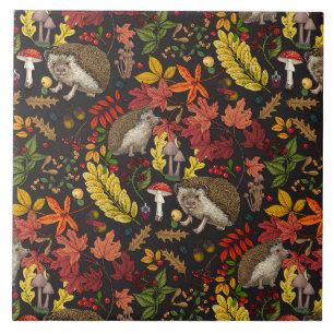 Hedgehogs and autumn forest flora on black ceramic tile