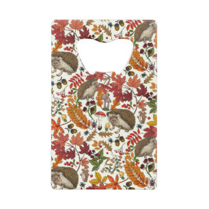 Hedgehogs and autumn forest flora on ivory