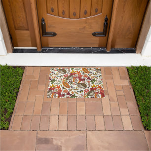 Hedgehogs and autumn forest flora on ivory doormat