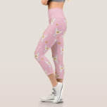 Hedwig Pink Solstice Pattern Capri Leggings<br><div class="desc">Sweet, celestial, and full of wizarding charm, this enchanting Hedwig pattern design brings a dreamy touch of magic to any product. Featuring graceful Hedwigs delivering golden-sealed letters, this whimsical print is scattered with crescent moons, glowing suns, and delicate constellation details across a soft blush background. The light pastel palette and...</div>