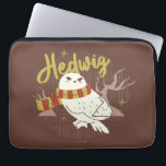 Hedwig Whimsical Forest Drawing Laptop Sleeve<br><div class="desc">Show your house spirit in the coziest way with this charming Hedwig™ design. Featuring the beloved snowy owl bundled up in a warm Gryffindor house-colored scarf, this playful illustration captures the magic and loyalty of Harry Potter’s trusted companion. Set against a whimsical woodland backdrop with subtle sparkling accents, the hand-drawn...</div>