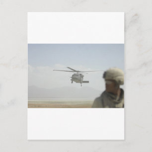 Helicopter picking up troops postcard