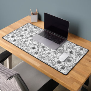 Hellebores in black and white desk mat