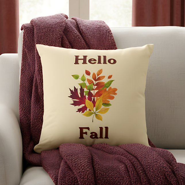 Hello Fall - Farmhouse Rustic Autumn Home Accent Cushion (“Hello Fall” pillow with colorful leaves and blanket creates a cozy autumn vibe.)