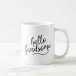 Hello Handsome Coffee Mug<br><div class="desc">This darling coffee mug will be a perfect compliment to your kitchen or office desk. This design features the quote "hello handsome" in a handwritten black font and is accented with a black swish.</div>