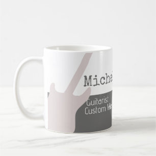 her professional (guitarist) half-grey half-white coffee mug