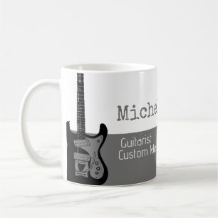 her professional (guitarist) half-grey half-white coffee mug