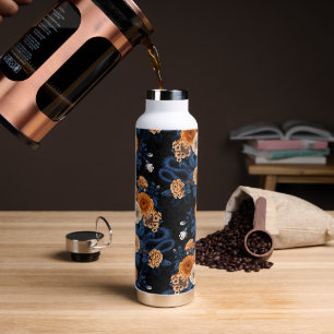 Hidden in the roses, orange and blue water bottle