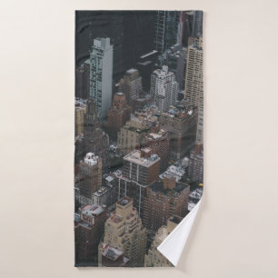 HIGH-ANGLE PHOTOGRAPHY OF CITY BUILDING S BATH TOWEL