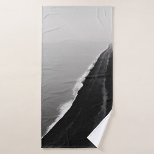 HIGH ANGLE PHOTOGRAPHY OF SEASHORE BATH TOWEL