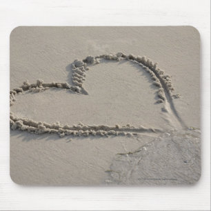 High angle view of a heart shape on the beach mouse pad