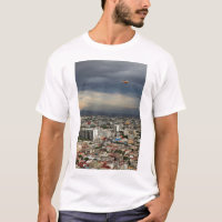High Angle View Of Cityscape Against Cloudy Sky