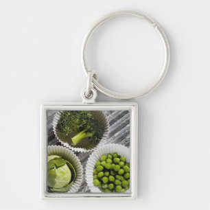 High angle view of vegetables in paper cups key ring