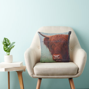 Highland Cow Biting A Wire Fence Cushion
