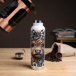 Highland Cow Black White Plaid Floral Rustic  Water Bottle<br><div class="desc">Cute Highland Cow with Black and white plaid bow and flowers on the design.  The water bottle holds 22 ounces.</div>