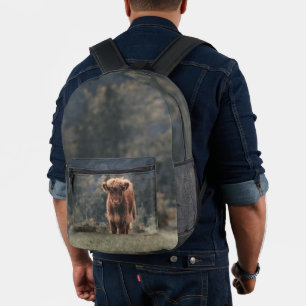 Highland cow calf autumn grass field printed backpack